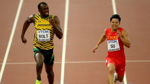 Bingtian Su, in this photo, is running alongside Usain Bolt at the 2015 World Championships