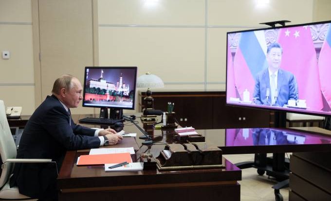 Against diplomatic boycott, Putin tells Xi he will go to Beijing Olympics