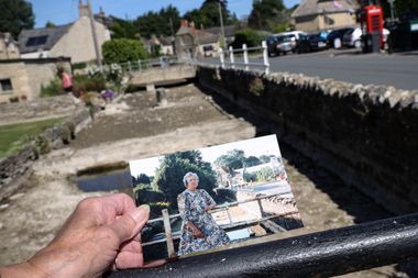 He shows an image of himself standing on the banks of the Thames in a 1976 photograph by Jean Legg, in the same spot, now with no river in the background of the drought. 