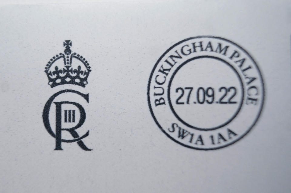King Charles III's new cipher 'CIIR' is pictured after it was printed at the Court Post Office at Buckingham Palace in central London on September 27, 2022 - Buckingham Palace on Monday unveiled King Charles III's new royal cipher -- a new monogram of government buildings, state documents and his initials. Post boxes.  His late mother Queen Elizabeth II's cipher is EIIR, which stands for Elizabeth II Regina (Queen in Latin).  Charles III would be CIIR for Rex (king in Latin), interlaced with CR, III within R and crown above two letters.  (Photo by YUI MOK / POOL / AFP) (Photo by YUI MOK/POOL/AFP via Getty Images)