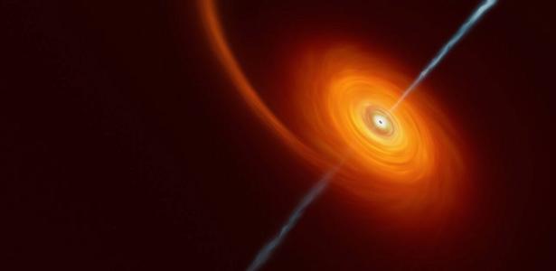 A star being devoured by a black hole in the universe